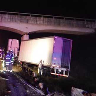 tractor trailer collision with bridge